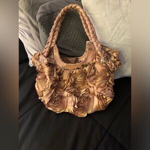 Very unique rose covered handbag